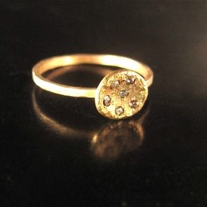 14k yellow gold ring with 0.06 rough diamonds.